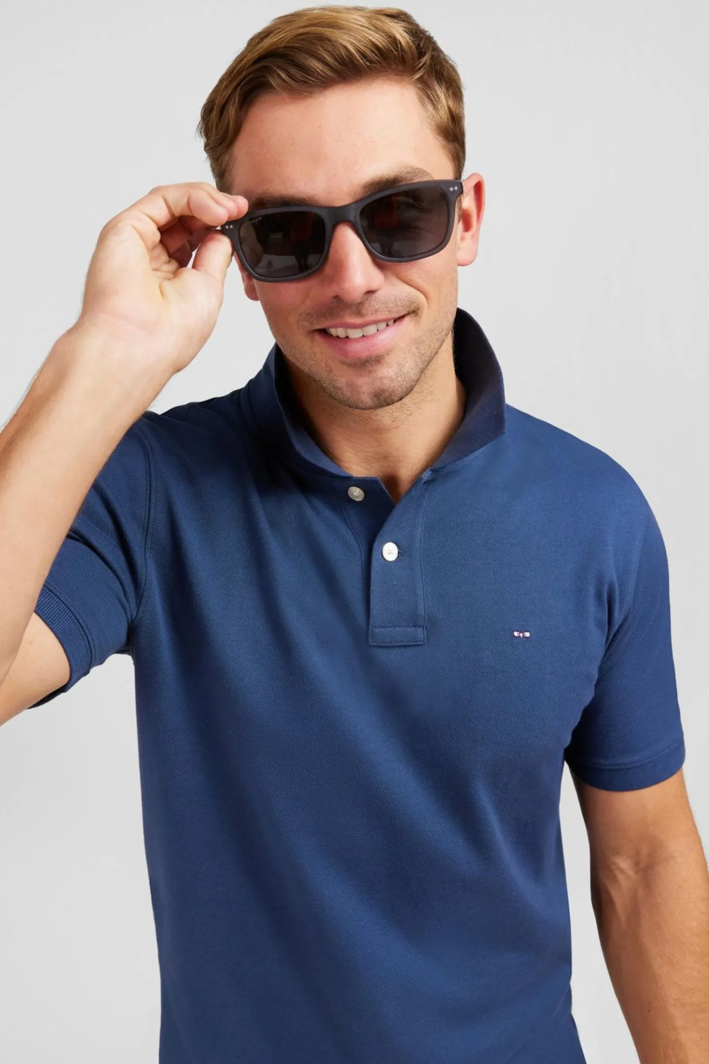 Polo Bleu Fonce Uni A Manches Courtes